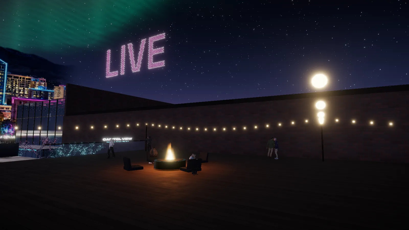 The rooftop at night, with a fire pit, string lights, and the word LIVE drawn in the sky
